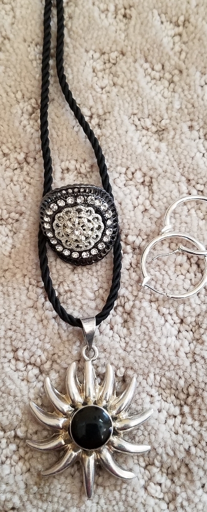 Necklace, earrings and ring.